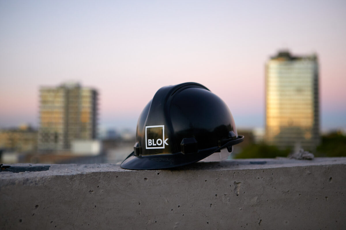 hard hat on rooftop edge